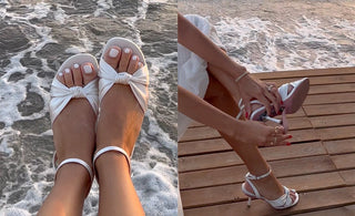 White convertible sandals shown in two styles: flat with knotted straps by the water and heeled with ankle straps on a wooden deck.