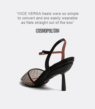 Side-back view of black high-heeled shoe with crystal embellishments and mesh