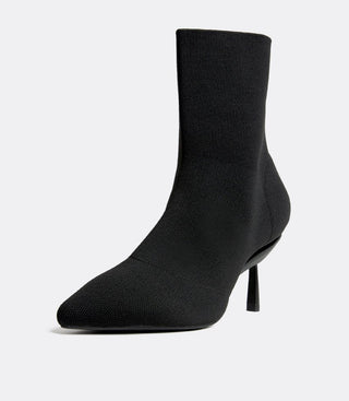 Black knit ankle boot with pointed toe and stiletto heel