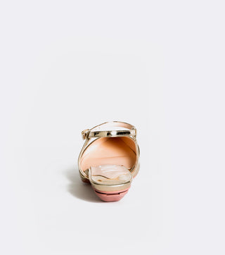 flat product shot of gold shoes