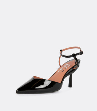 Front view of black ankle strap pumps.
