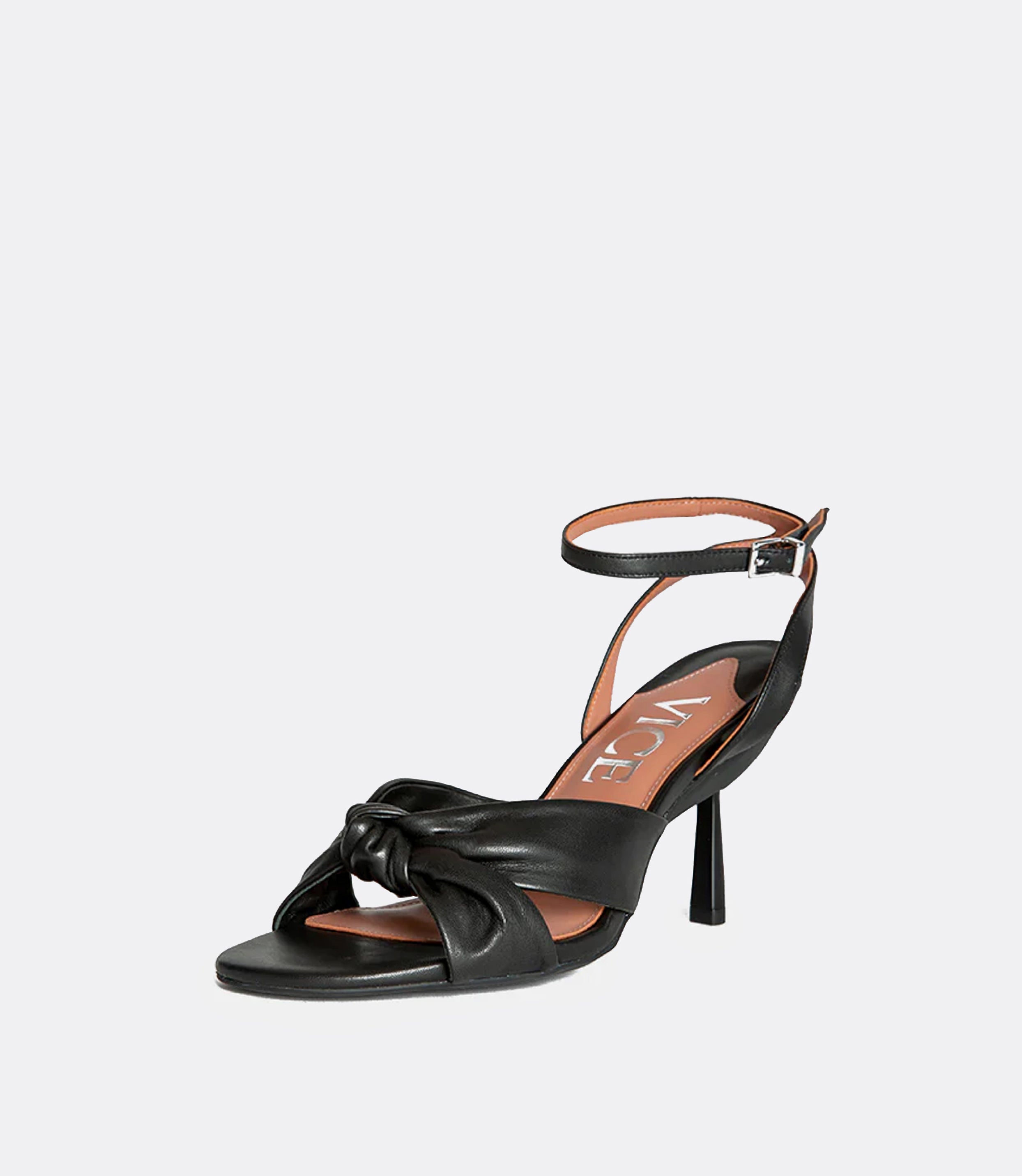 Front view of a black leather sandal as a heel.