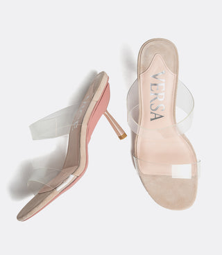Pair of beige high-heeled shoes with clear straps on a white background, featuring the VICE VERSA brand.
