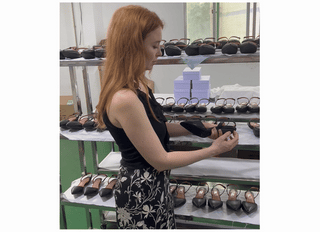 Alanna folding high heels in production