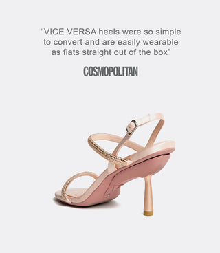 Rose gold high-heeled shoe with text on a white background