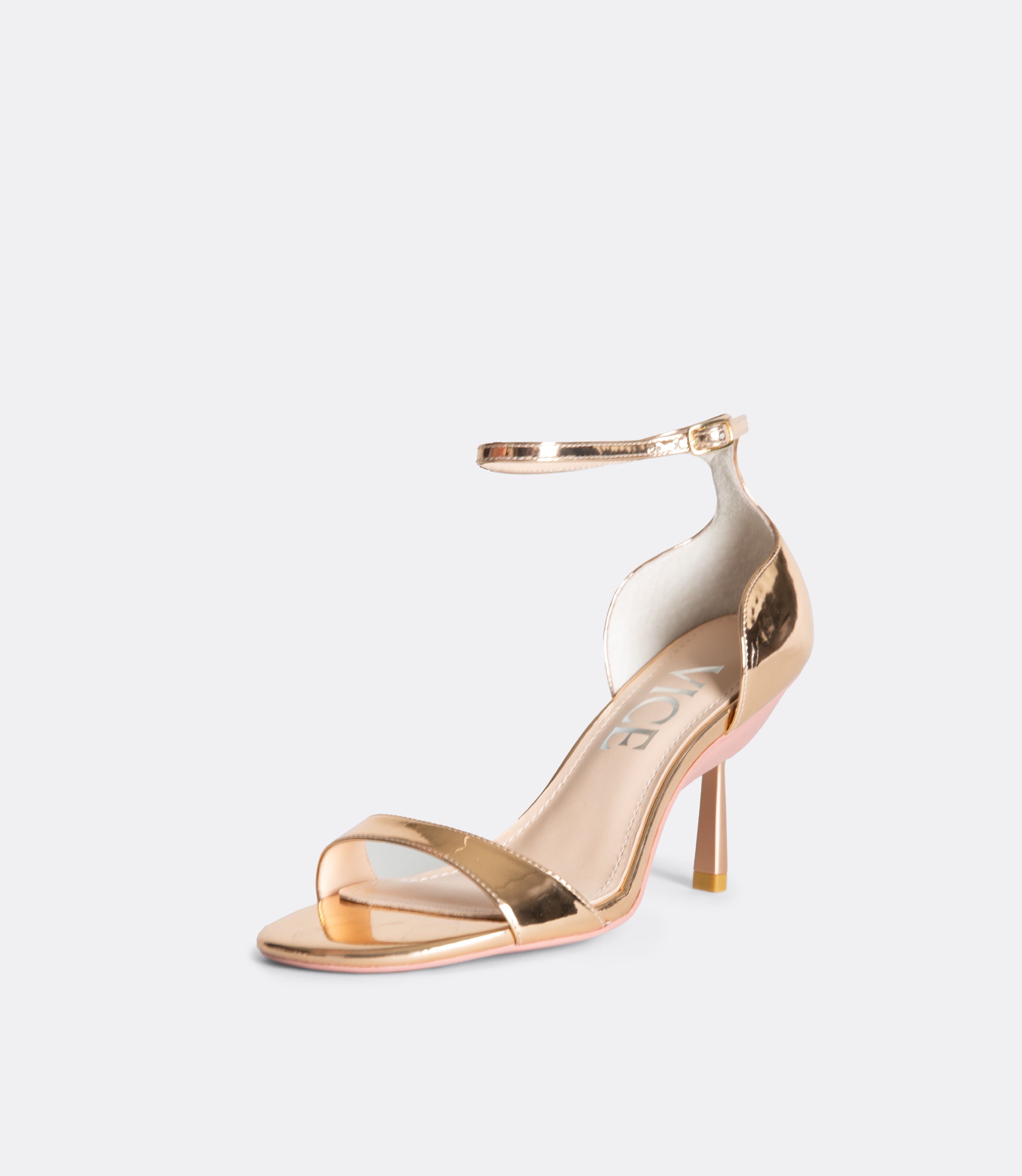 Front view of the rose gold editor sandal.