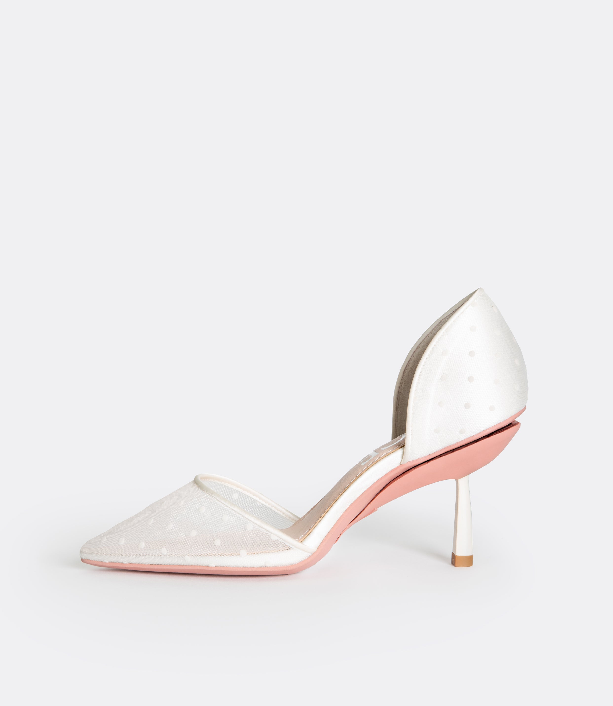 Side view of the white polka dot mesh heel