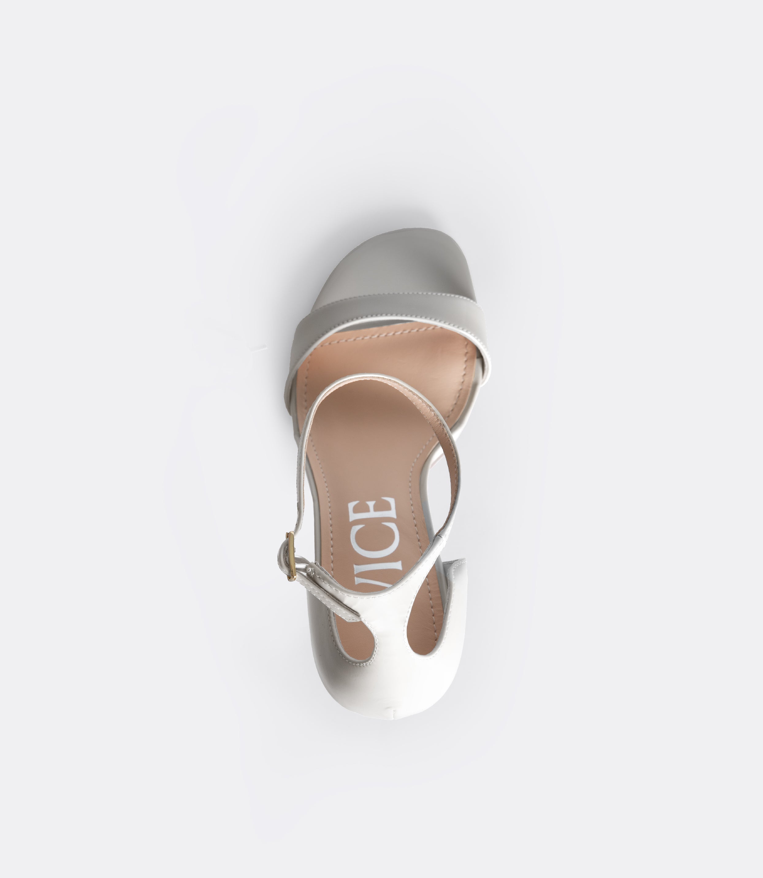 Top view of the white editor sandal.