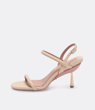 Side view of the beige leather heel.