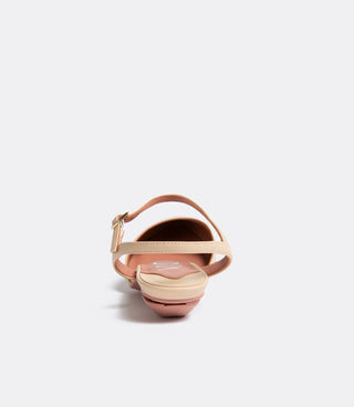 Beige sandal with ankle strap viewed from the back on a white background