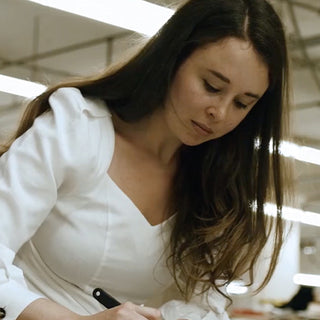 Alanna Fusaro drawing at the factory