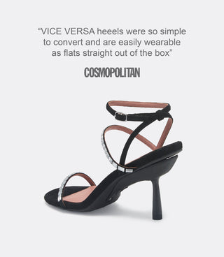 "VICE VERSA heels were so simple to convert and are easily wearable as flats straight out of the box" Cosmopolitan quote above a black suede strappy heel with rhinestones.