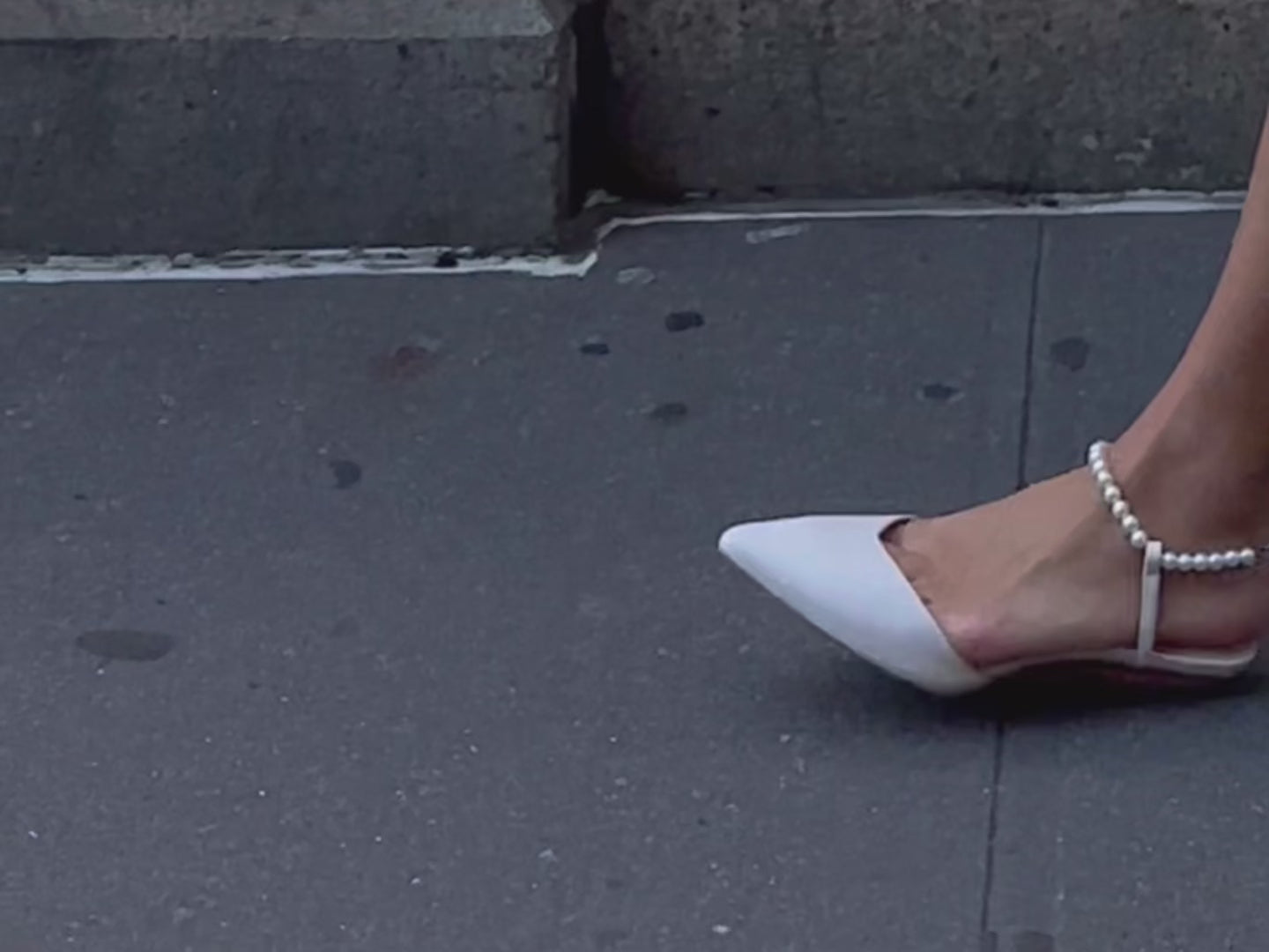 White pearl sandals as a flat