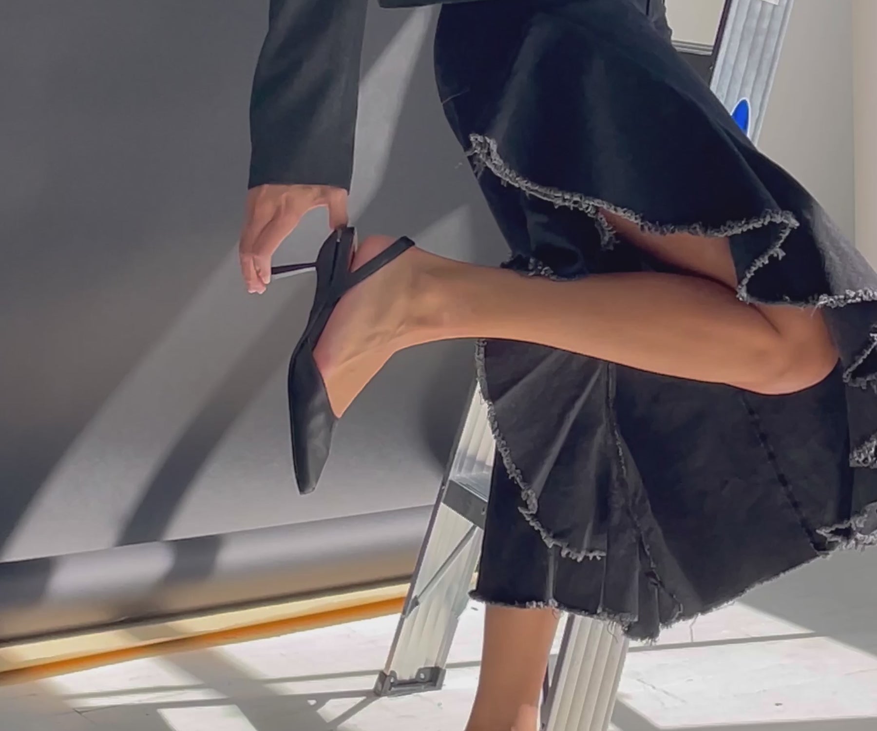 fold to flat black heels