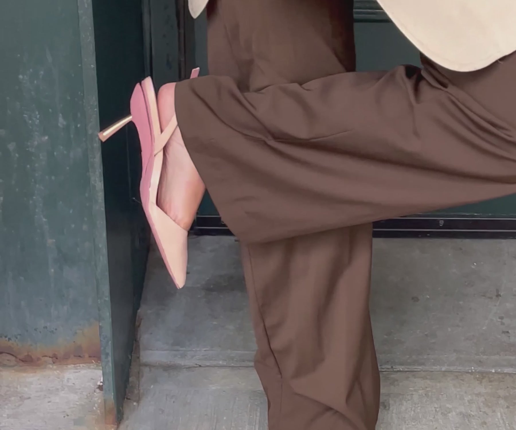 Beige heels folding to a flat