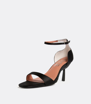 Front view of the black silk sandal as a heel.