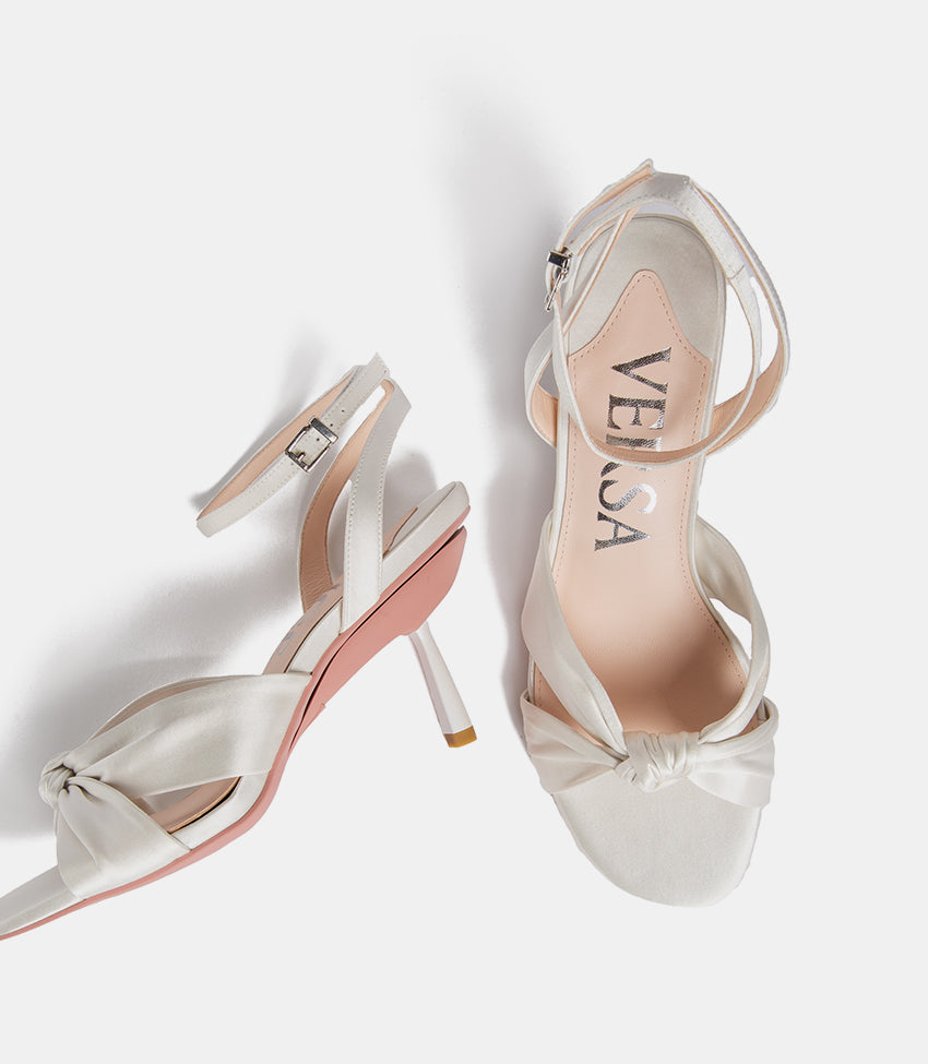 top and side view of white silk sandals'
