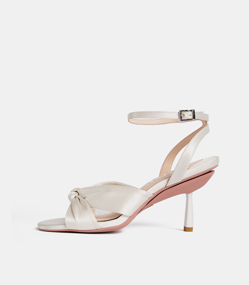 side view of white sandals