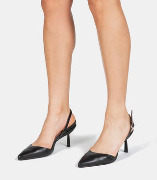 Model wearing black heels